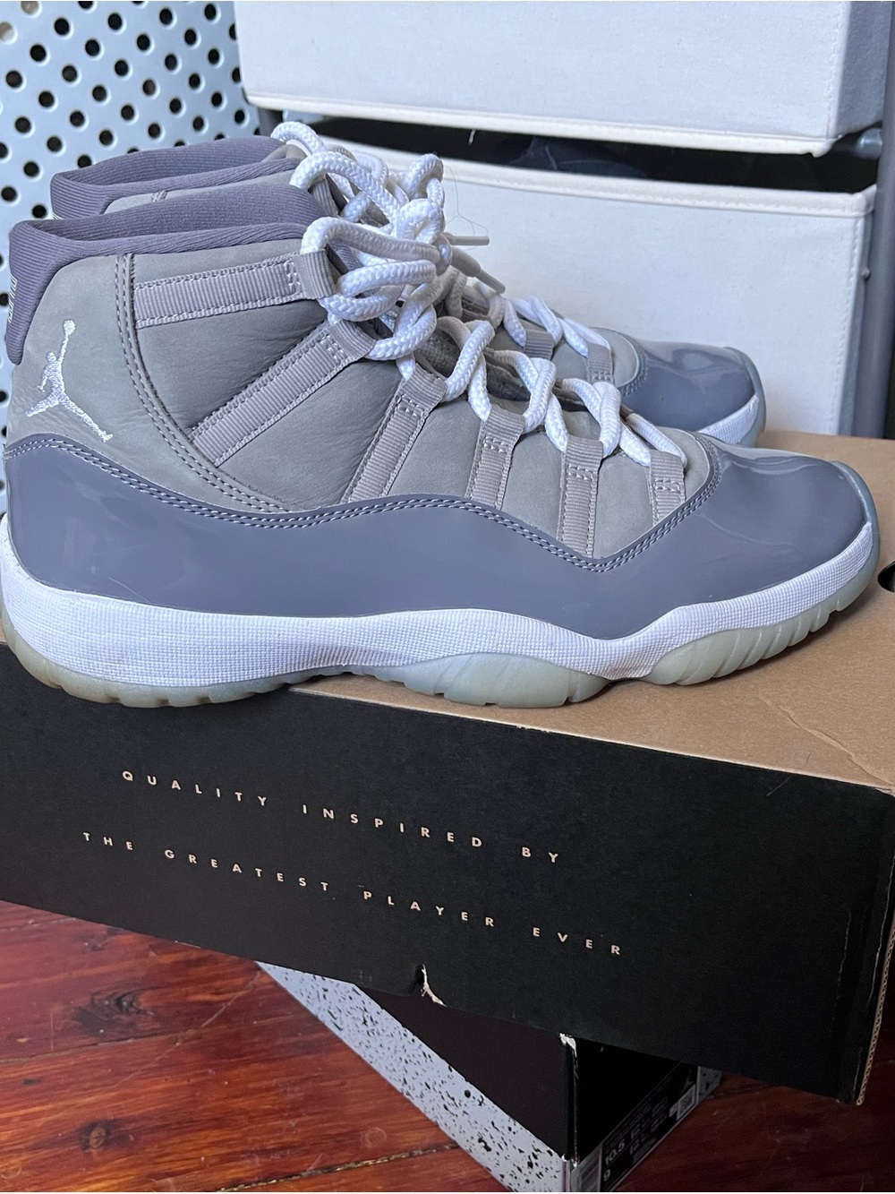 Jordan Women’s High-Top Sneakers in Grey and White